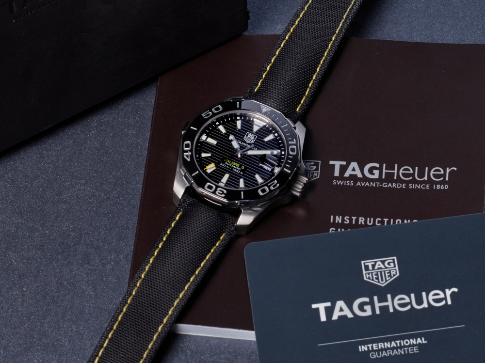 TAG HEUER | AQUARACER CALIBRE 5, A STAINLESS STEEL WRISTWATCH WITH CERAMIC BEZEL AND DATE, CIRCA 2017