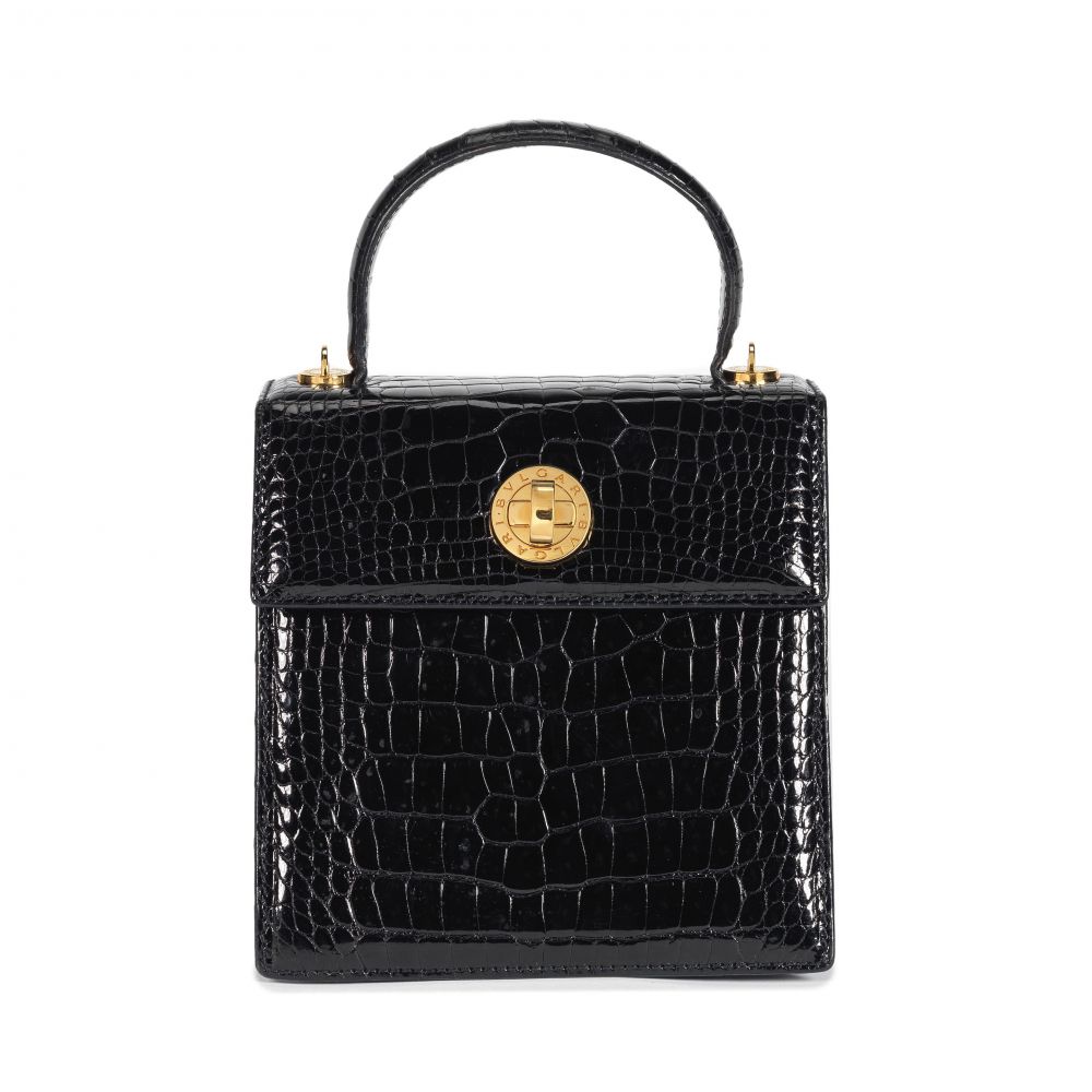 BVLGARI: A SHINY BLACK BABY CROCODILE MINI ACCORDION HANDBAG