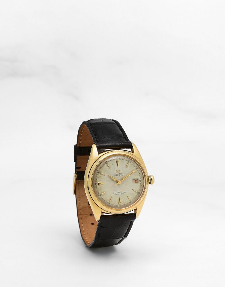 ROLEX. MONTRE BRACELET EN OR JAUNE 18K (750) BUBBLE BACK AVEC DATEUR ROULETTE MOUVEMENT AUTOMATIQUE