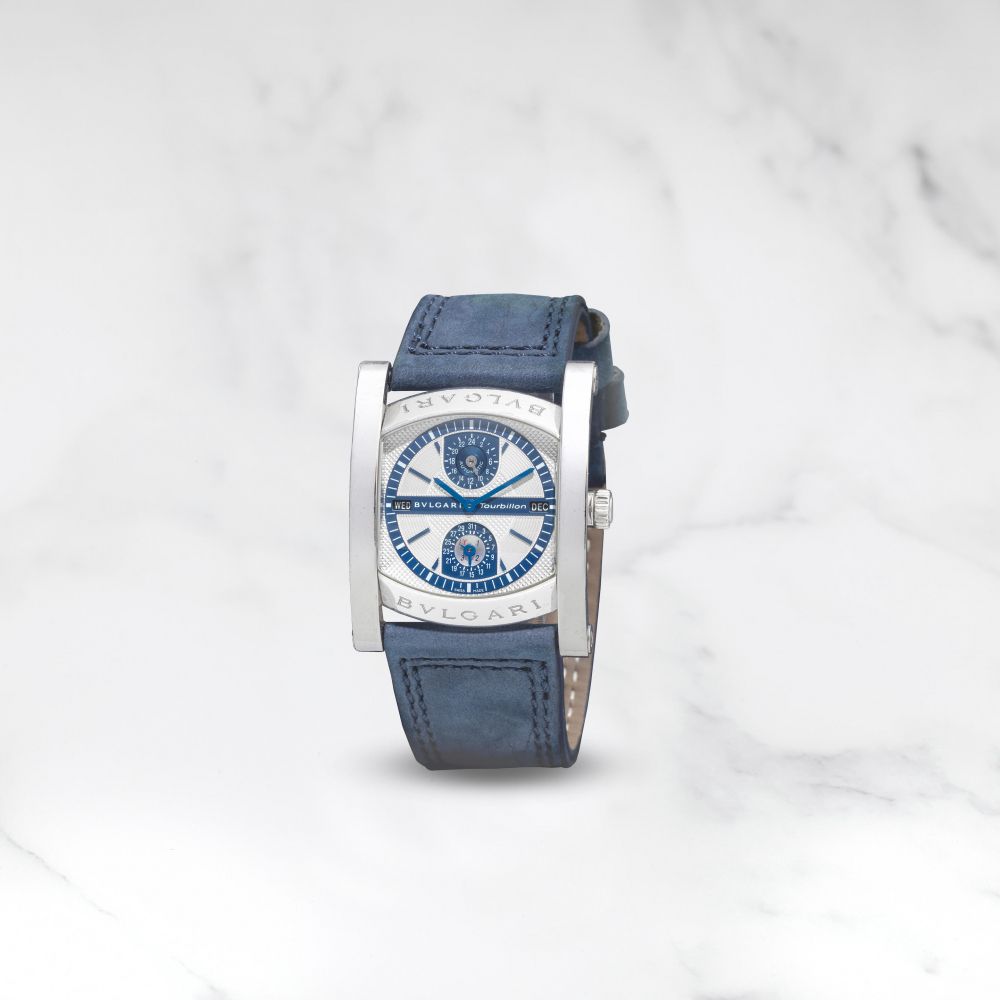 BULGARI. BELLE MONTRE BRACELET EN PLATINE (950) QUANTIEME PERPETUEL ET DOUBLE FUSEAU HORAIRE EN EDITION LIMITEE MOUVEMNT TOURBILLON AUTOMATIQUE