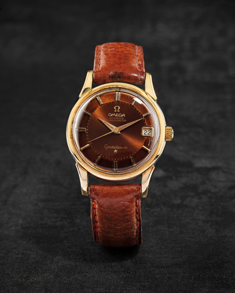 OMEGA. MONTRE BRACELET EN OR ET ACIER AVEC DATE ET CADRAN 'PIE-PAN' TROPICAL MOUVEMENT AUTOMATIQUE
