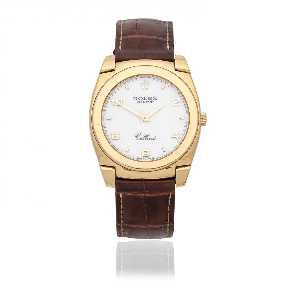 Rolex. An 18K gold manual wind wristwatch