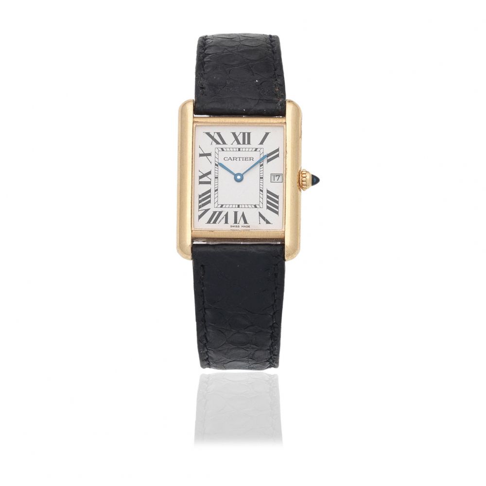 Cartier. An 18K gold quartz rectangular calendar wristwatch