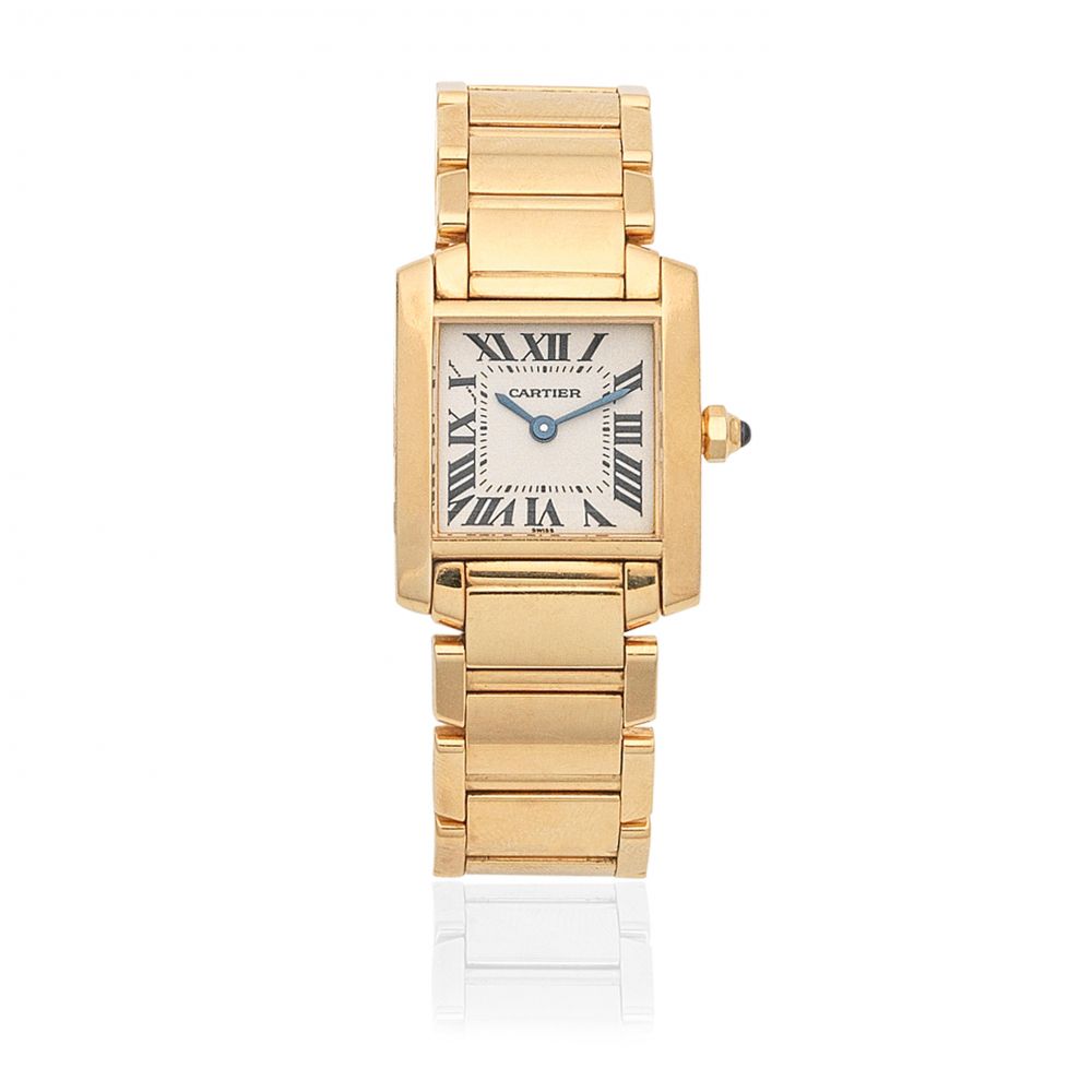 Cartier. A lady's 18K gold quartz rectangular bracelet watch