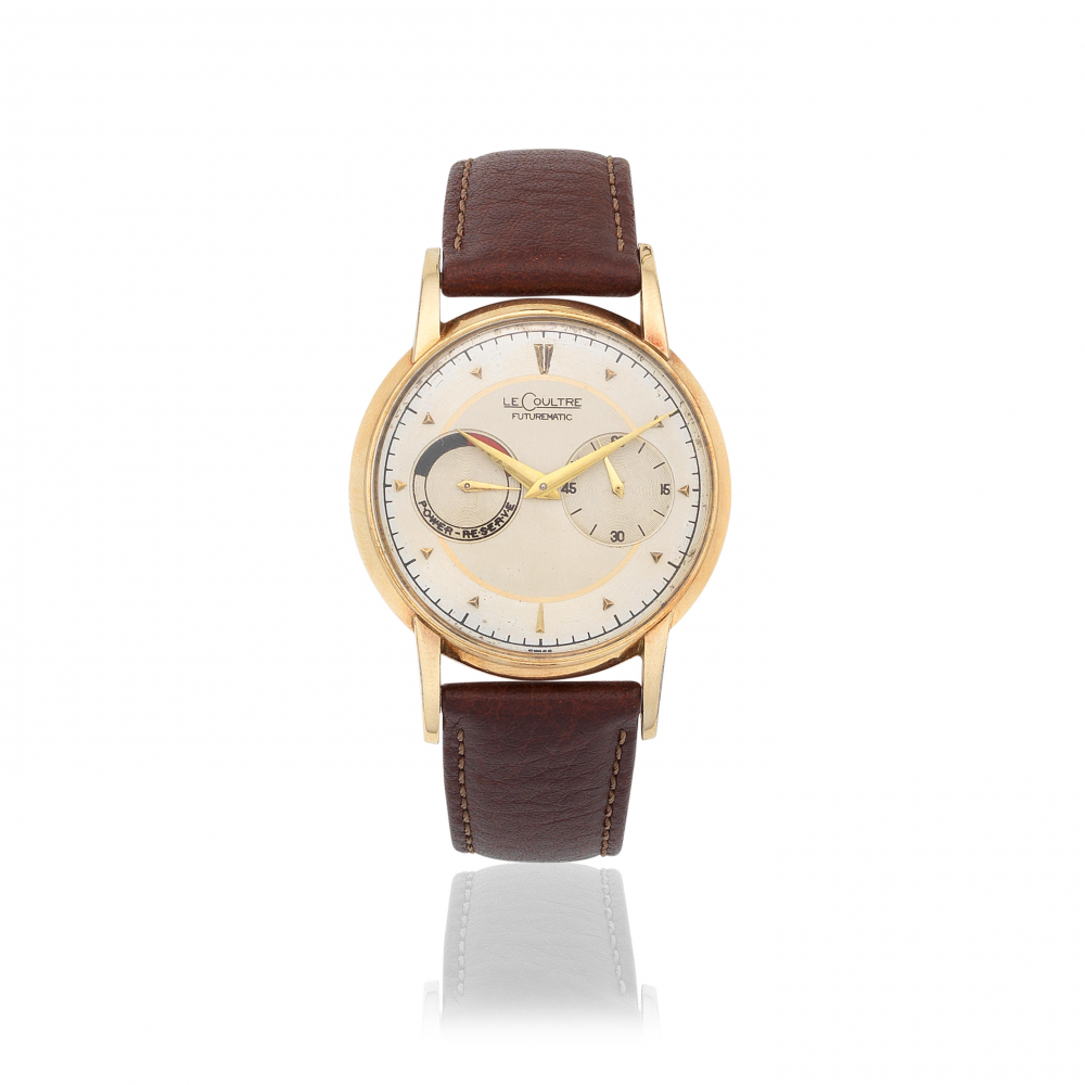 LeCoultre. A gold plated bumper automatic wristwatch with power reserve