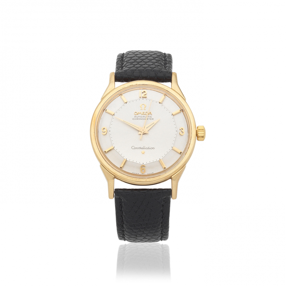 Omega. A 14K gold automatic wristwatch with pie-pan dial