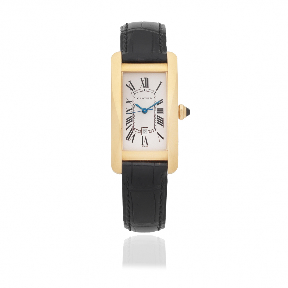 Cartier. An 18K gold automatic calendar wristwatch
