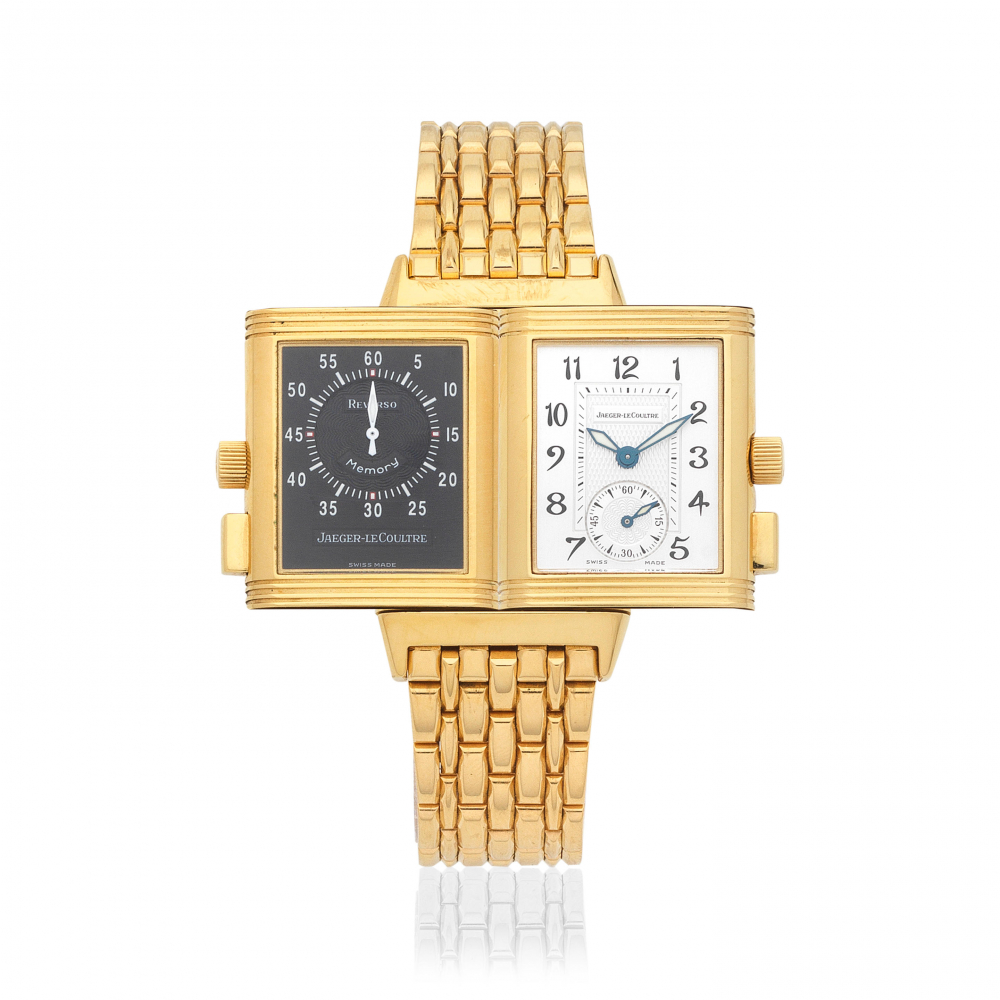 Jaeger-LeCoultre. An 18K gold manual wind reversible bracelet watch with 60 minute timing function