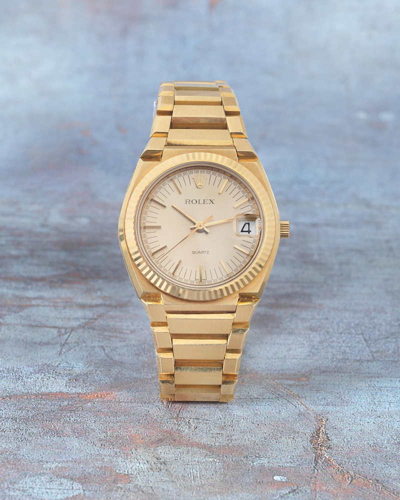Rolex. A rare 18K gold quartz calendar bracelet watch
