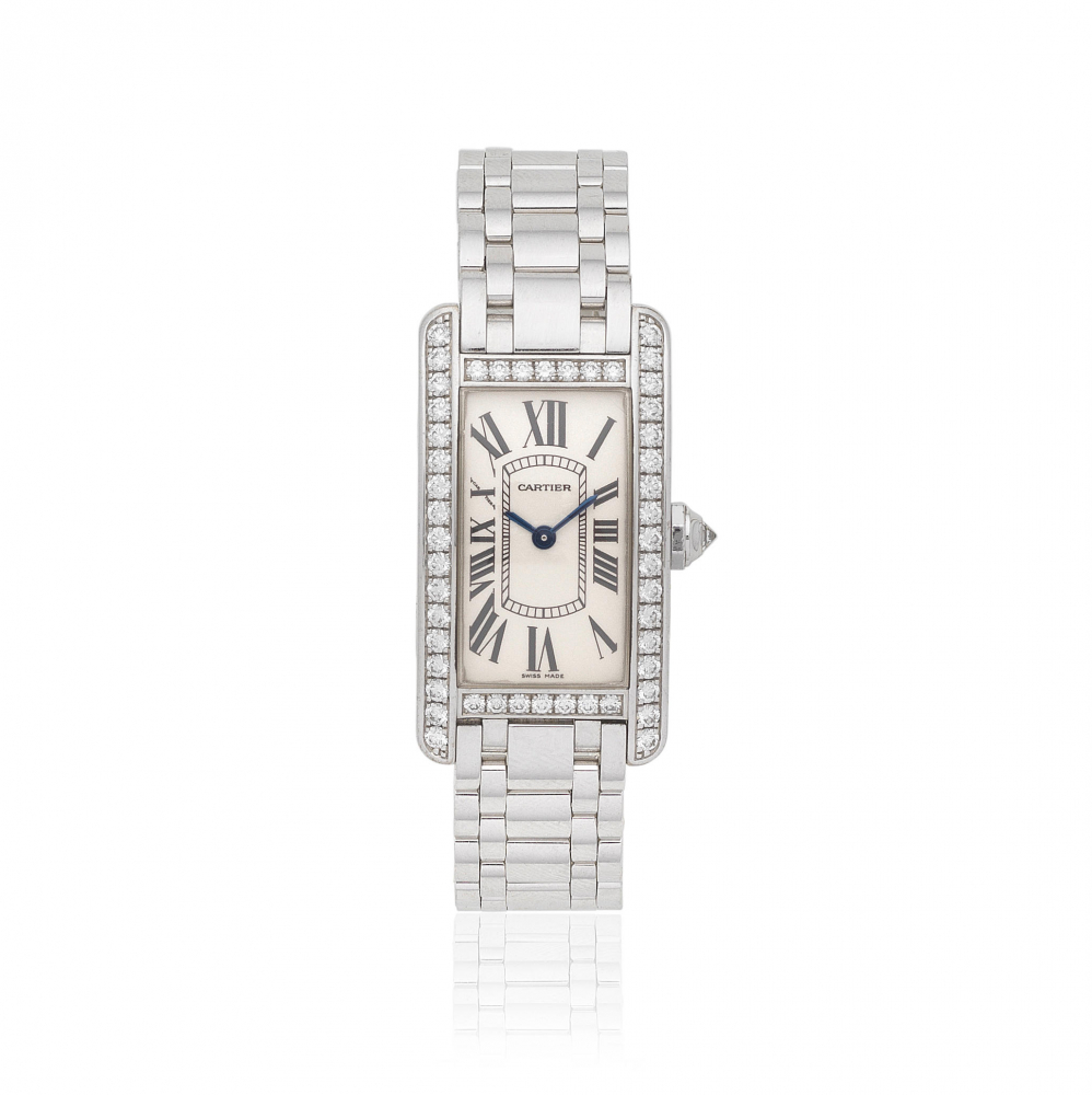 Cartier. A lady's 18K white gold diamond set quartz bracelet watch