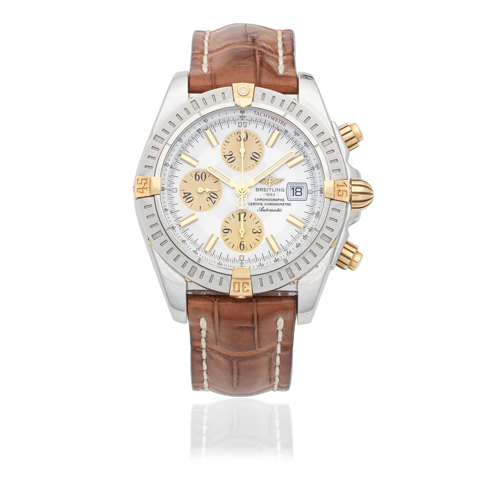 Breitling. A stainless steel automatic calendar chronograph wristwatch with mother of pearl dial