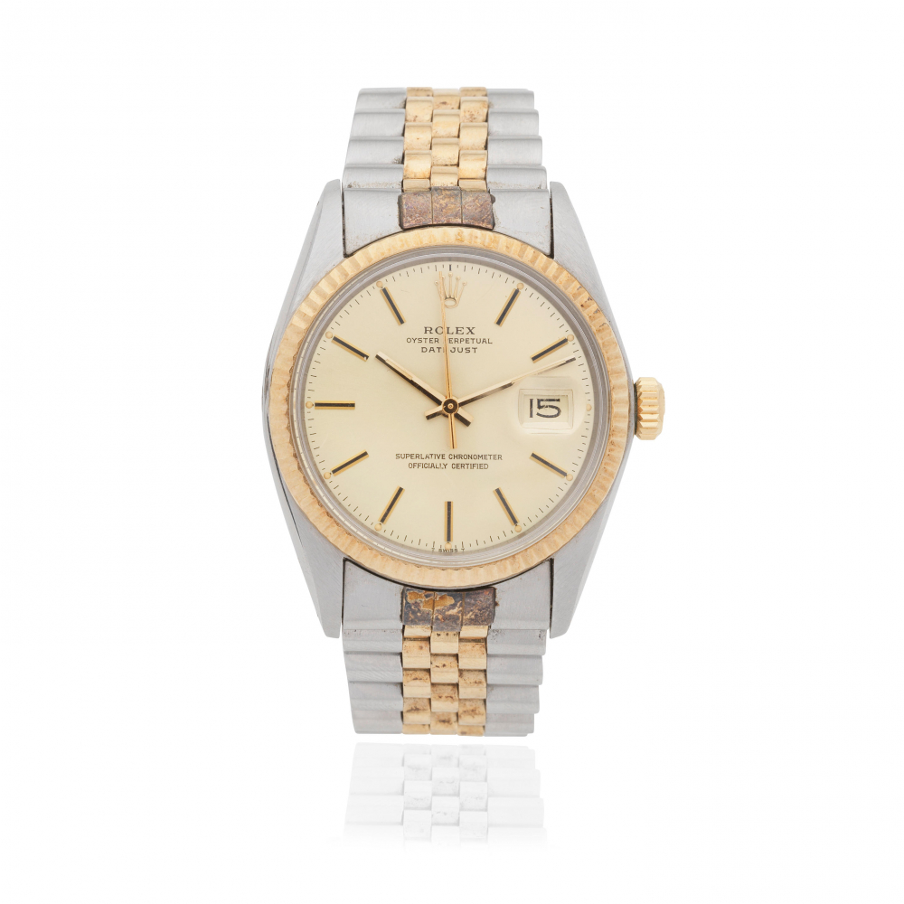 Rolex. A stainless steel and gold automatic calendar bracelet watch