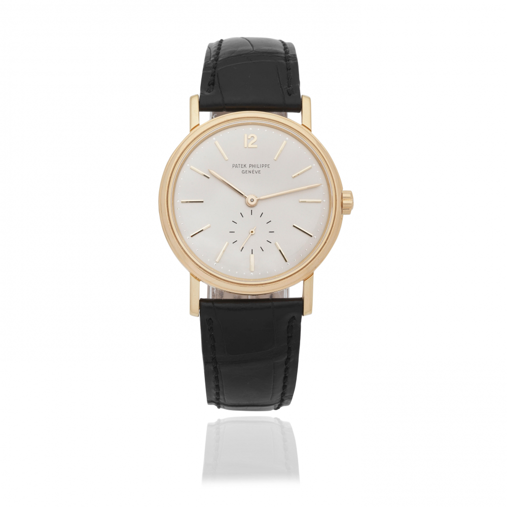 Patek Philippe. A recently serviced 18K gold automatic wristwatch