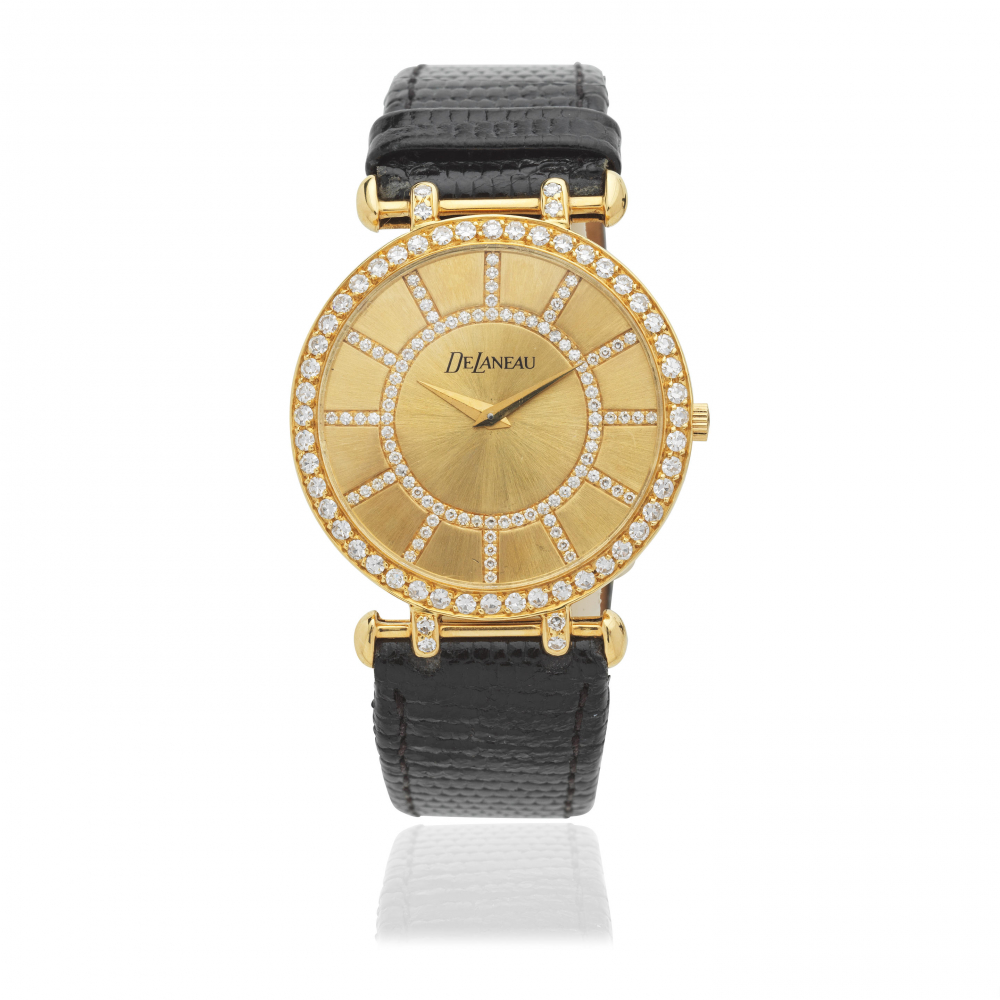 DeLaneau. An 18K gold and diamond set quartz wristwatch