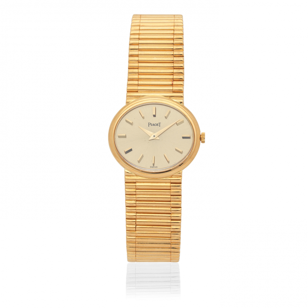 Piaget. A lady's 18K gold manual wind oval bracelet watch