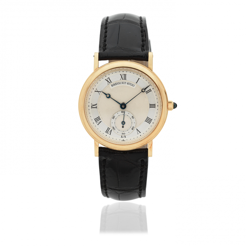 Breguet. An 18K gold manual wind wristwatch