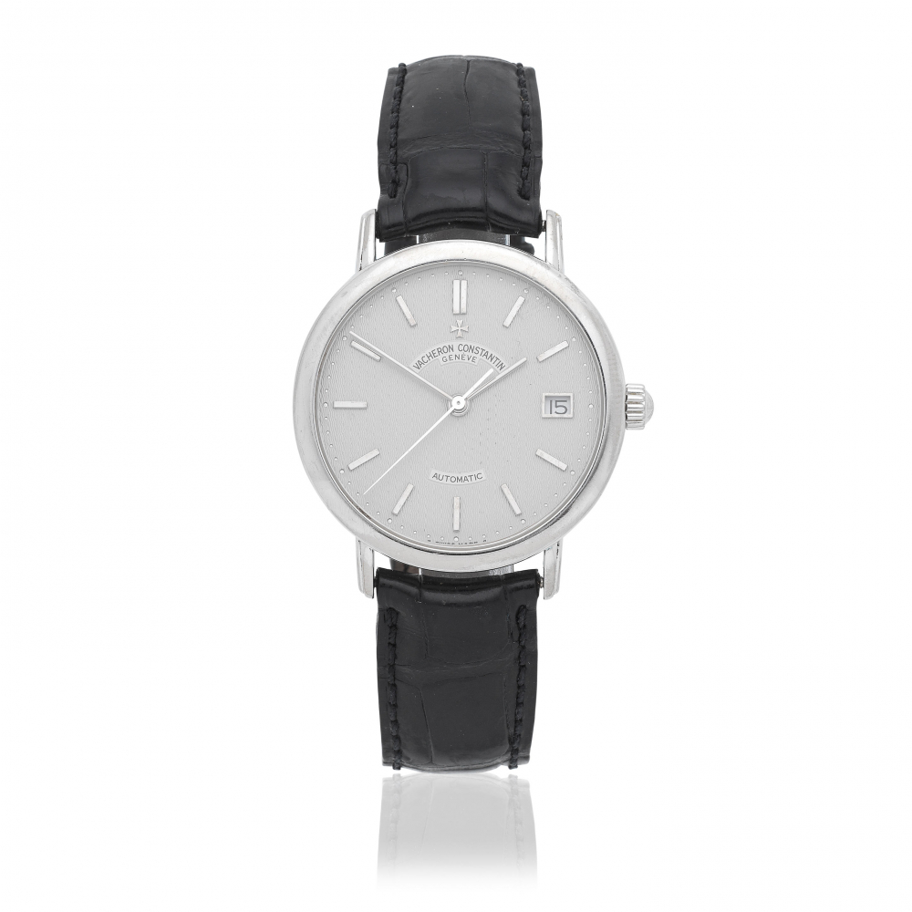 Vacheron Constantin. An 18K white gold automatic calendar wristwatch
