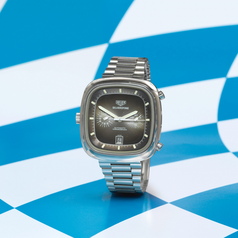 Heuer. A square stainless steel automatic calendar chronograph bracelet watch
