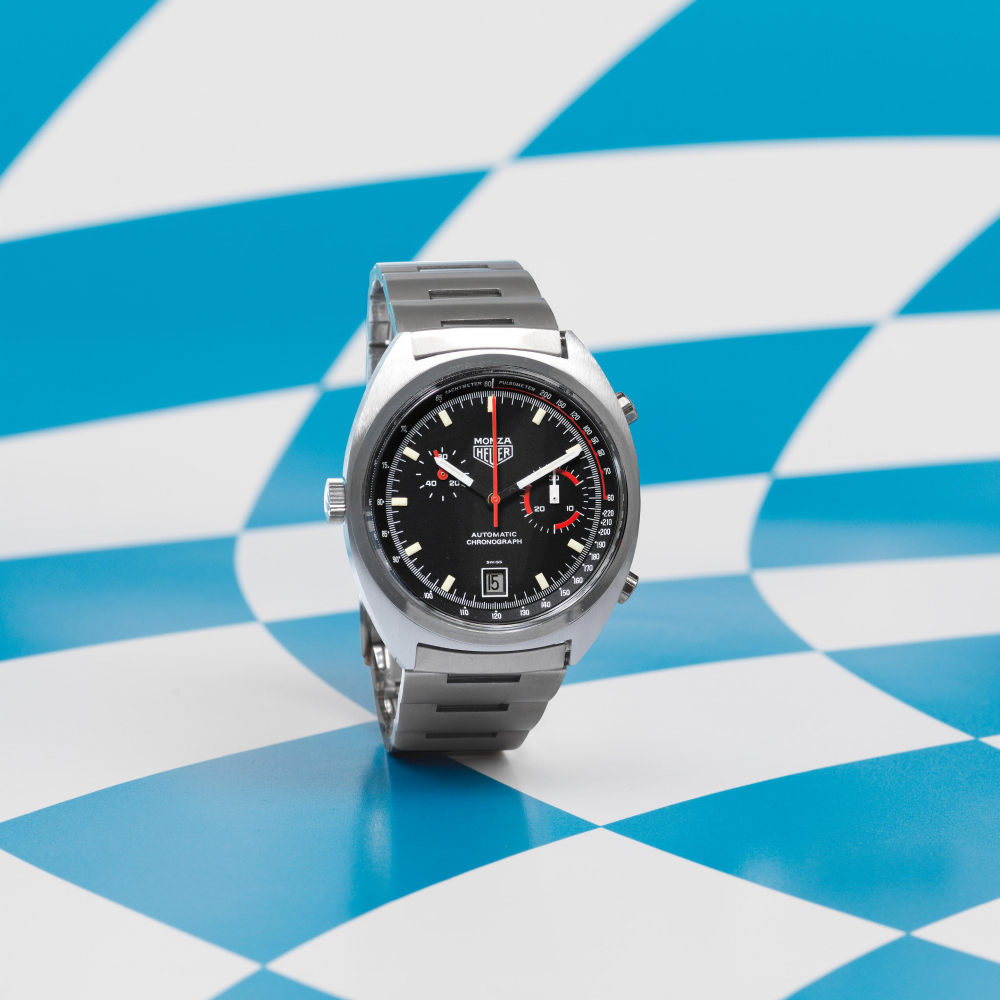 Heuer. A stainless steel automatic calendar chronograph wristwatch in NOS condition