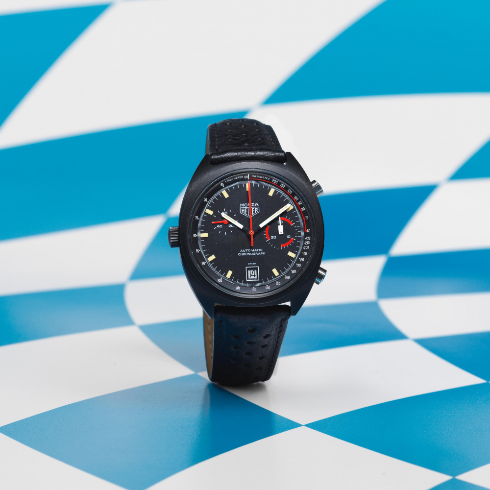 Heuer. A black PVD coated stainless steel automatic calendar chronograph wristwatch