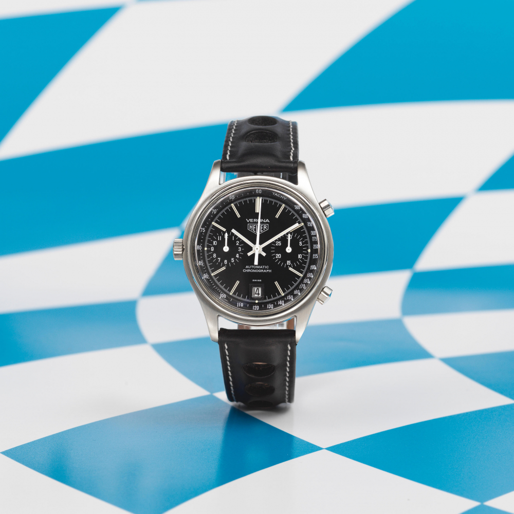 Heuer. A rare stainless steel automatic calendar chronograph wristwatch