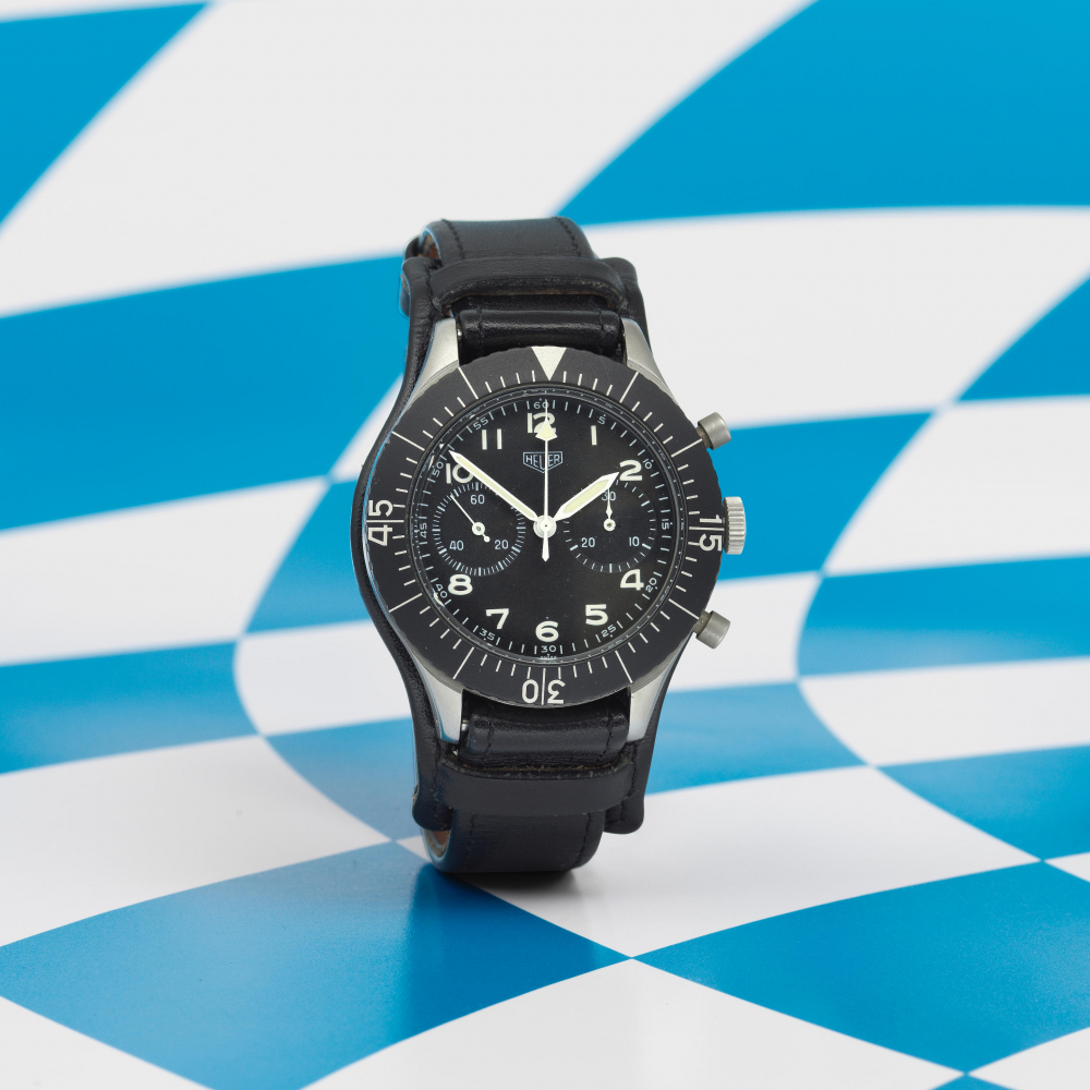 Heuer. A stainless steel military issue manual wind flyback chronograph wristwatch