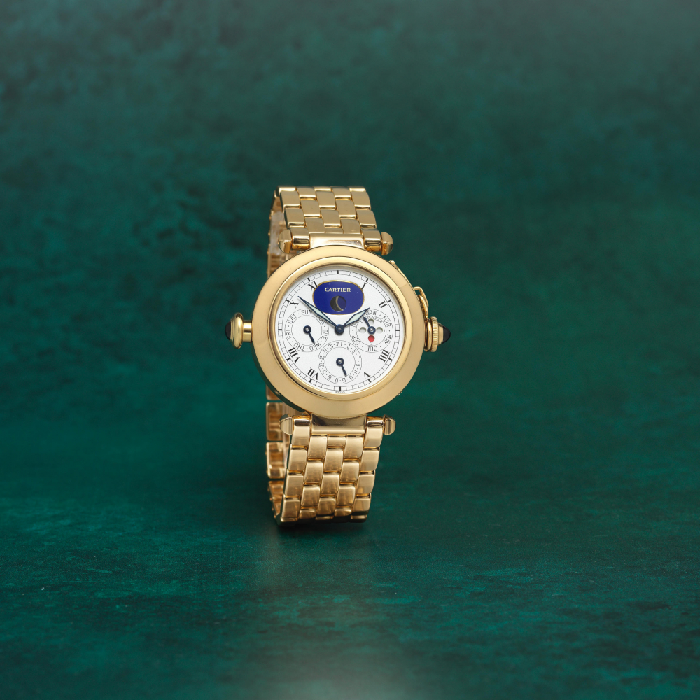 Cartier. A fine and rare 18K gold automatic minute repeating perpetual calendar bracelet watch with moon phase and leap year indication