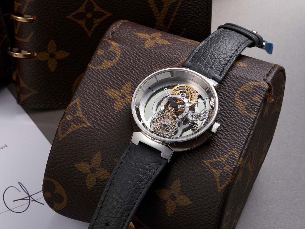 LOUIS VUITTON | TAMBOUR MOON FLYING TOURBILLON "POINÇON DE GENÈVE", REF.Q8EB2, A RARE CUSTOM MADE PLATINUM SKELETONISED TOURBILLON WRISTWATCH, CIRCA 2017
