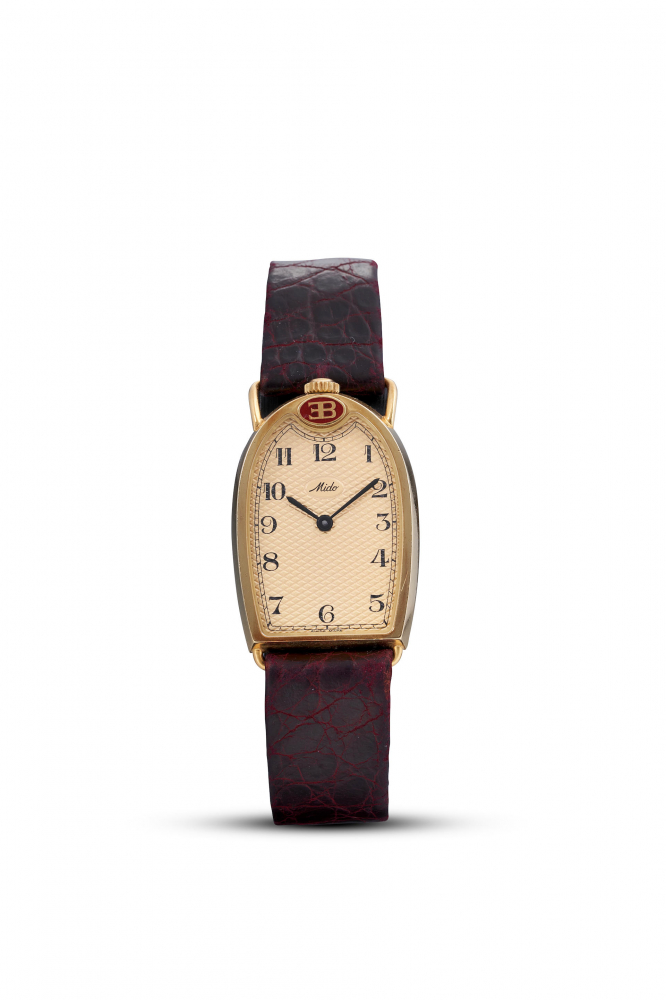 MIDO | BUGATTI, REF.160-9620, A YELLOW GOLD WRISTWATCH, CIRCA 1990
