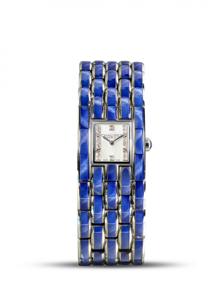 CHAUMET | KHESIS CRISTAL, A LIMITED EDITION STAINLESS STEEL AND BLUE STAR CRYSTAL BRACELET WATCH WITH MOTHER-OF-PEARL DIAL, CIRCA 2012