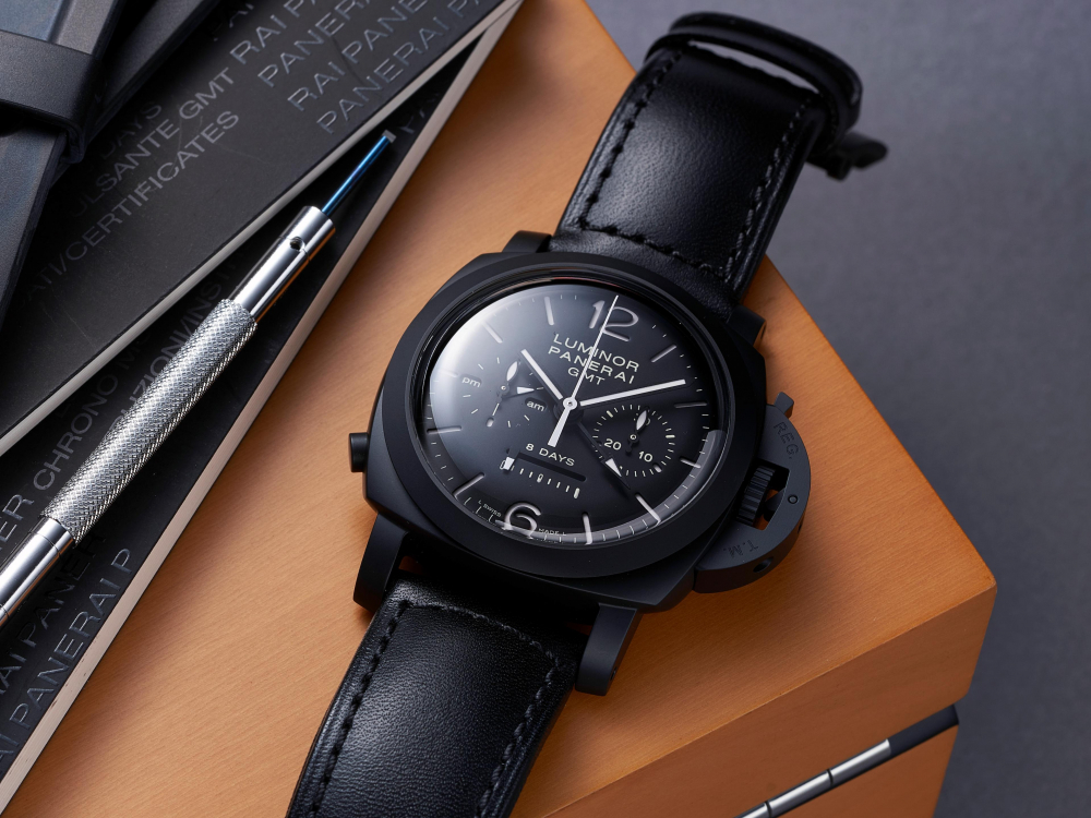 PANERAI | LUMINOR CHRONO MONOPULSANTE 8 DAYS GMT, REF.PAM00317, A NEW OLD STOCK LIMITED PRODUCTION BLACK CERAMIC DUAL TIME ZONE SINGLE BUTTON CHRONOGRAPH WRISTWATCH WITH 8-DAY POWER RESERVE AND DAY/NIGHT INDICATOR, CIRCA 2010