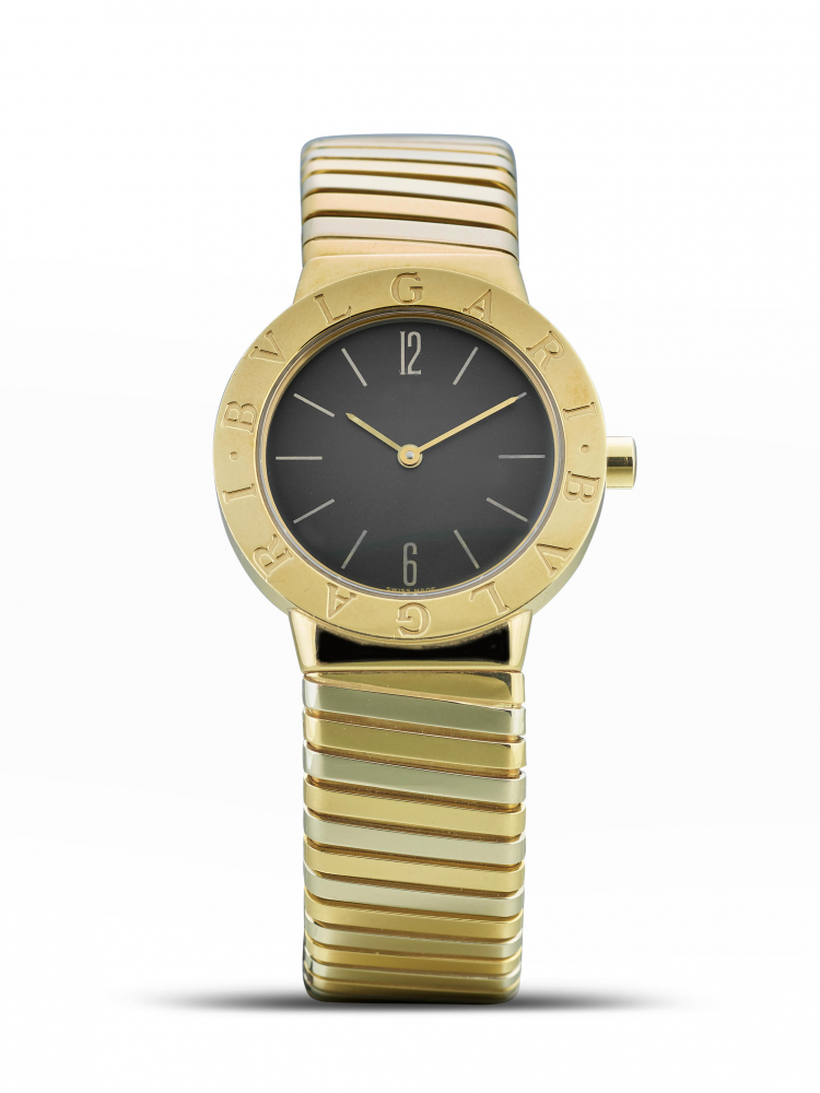 BVLGARI | TUBOGAS, REF.BB 30 2T, A YELLOW GOLD AND STAINLESS STEEL BANGLE WATCH, CIRCA 2000