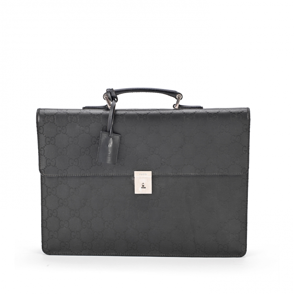 Gucci: a Black GG Supreme Canvas Briefcase