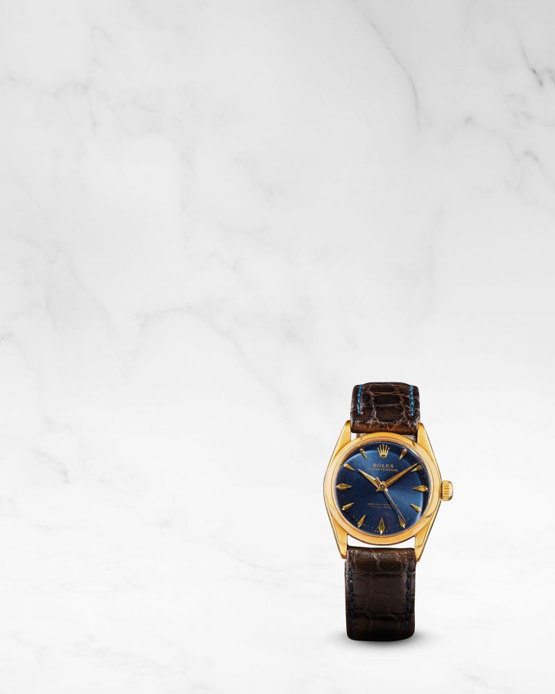 Rolex. Montre bracelet en or jaune 18K (750) taille medium avec rare cadran bleu mouvement automatique
