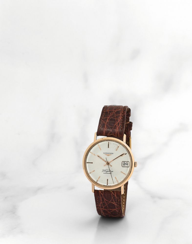 Longines. Montre bracelet en or jaune 18K (750) avec date mouvement automatique