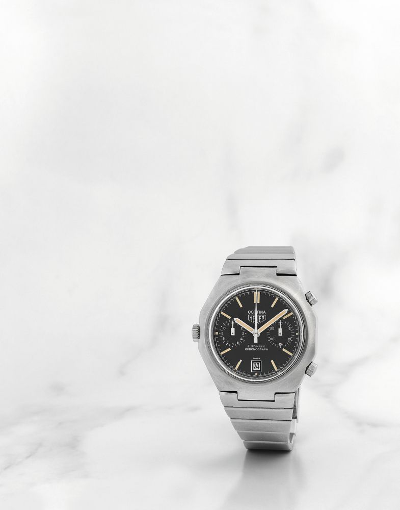 Heuer. Chronographe bracelet en acier avec date mouvement automatique