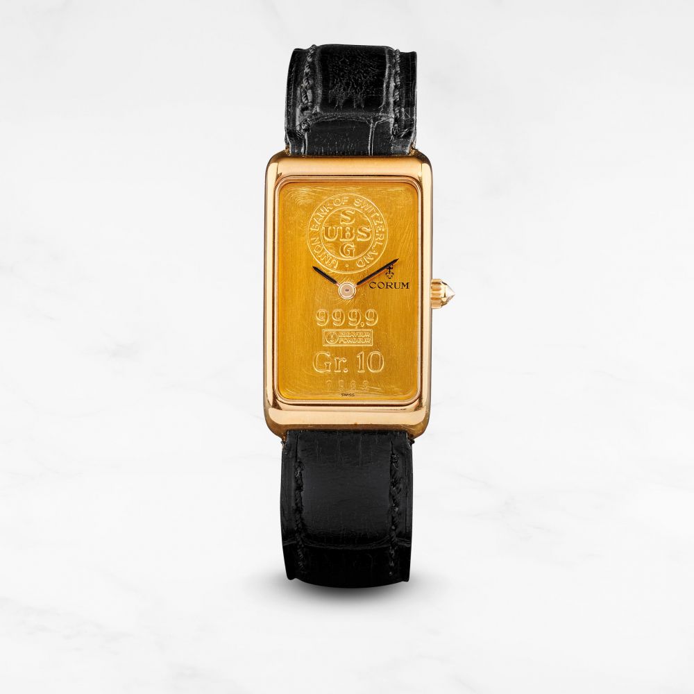 Corum. Montre bracelet en or jaune 18K (750) de forme rectangulaire avec cadran lingot mouvement mécanique