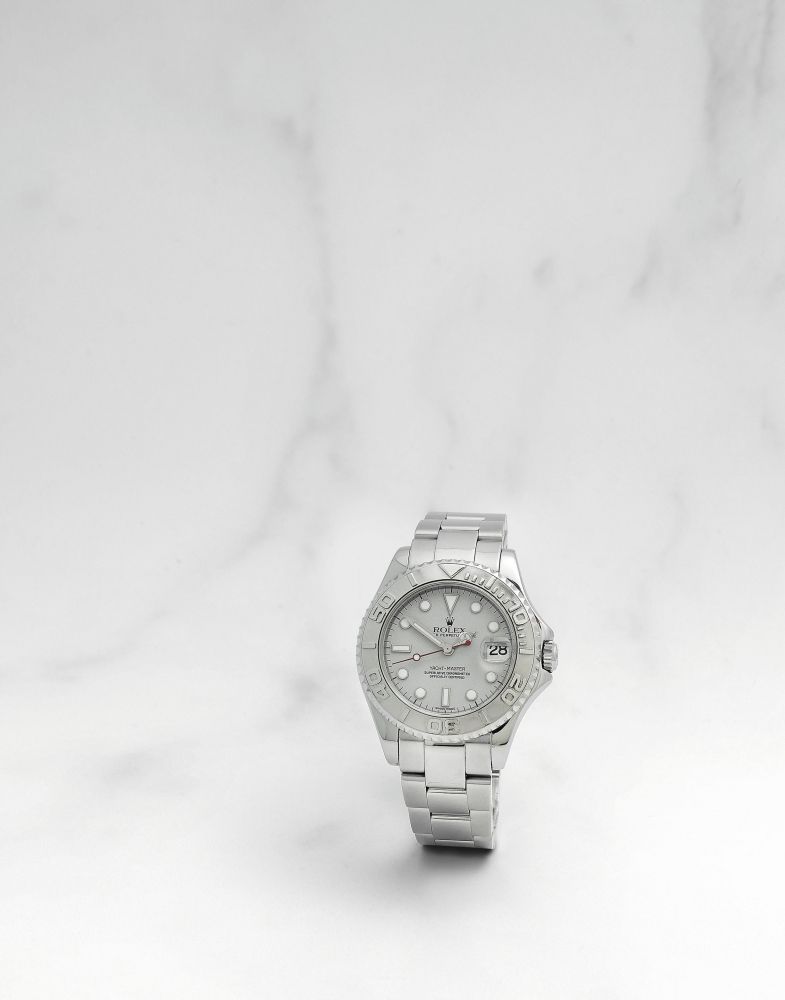Rolex. Montre bracelet en platine (950) et acier avec date mouvement automatique