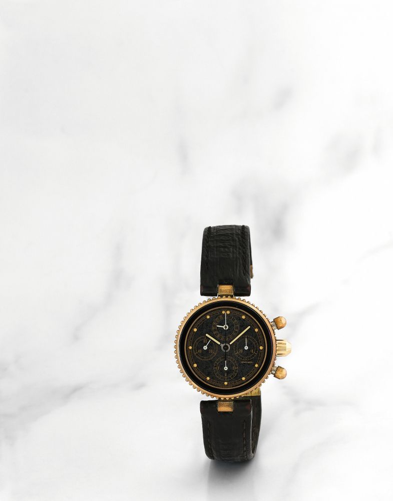 Gérald Genta. Chronographe bracelet en bronze et acier avec date mouvement automatique
