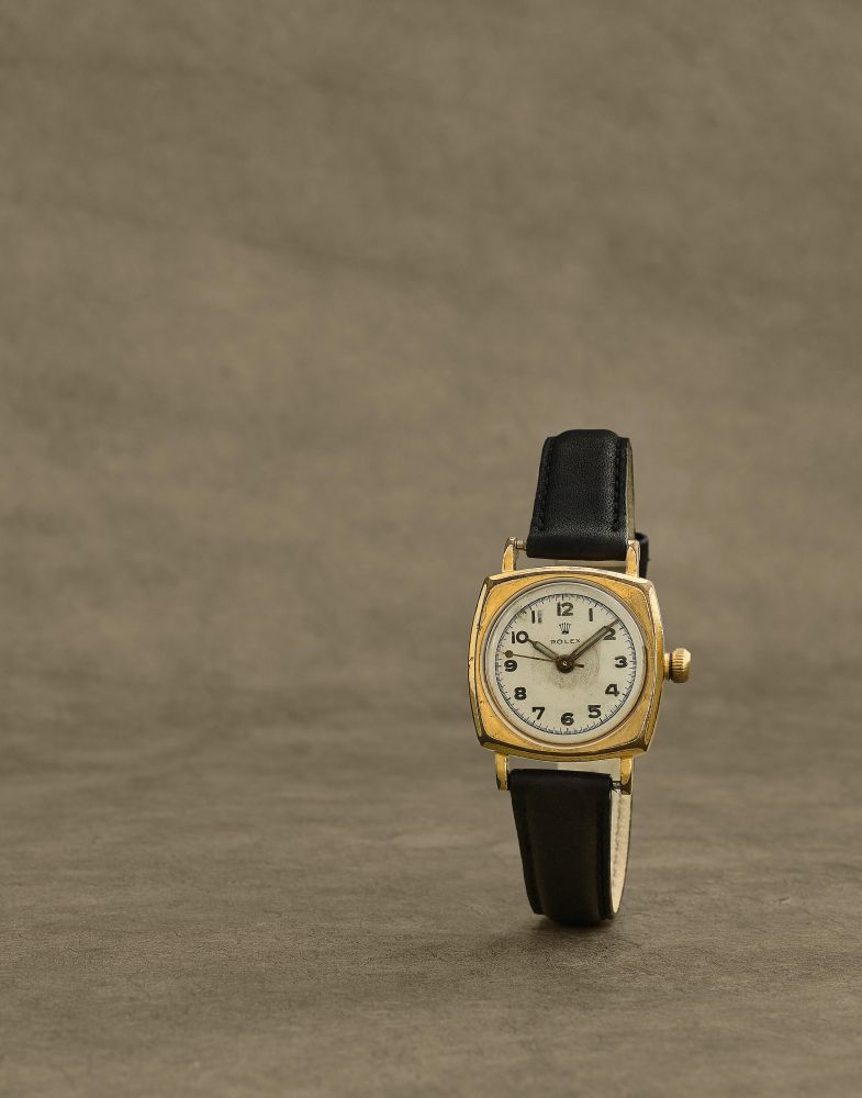 Rolex. Montre bracelet en plaque or et acier de forme coussin mouvement mecanique
