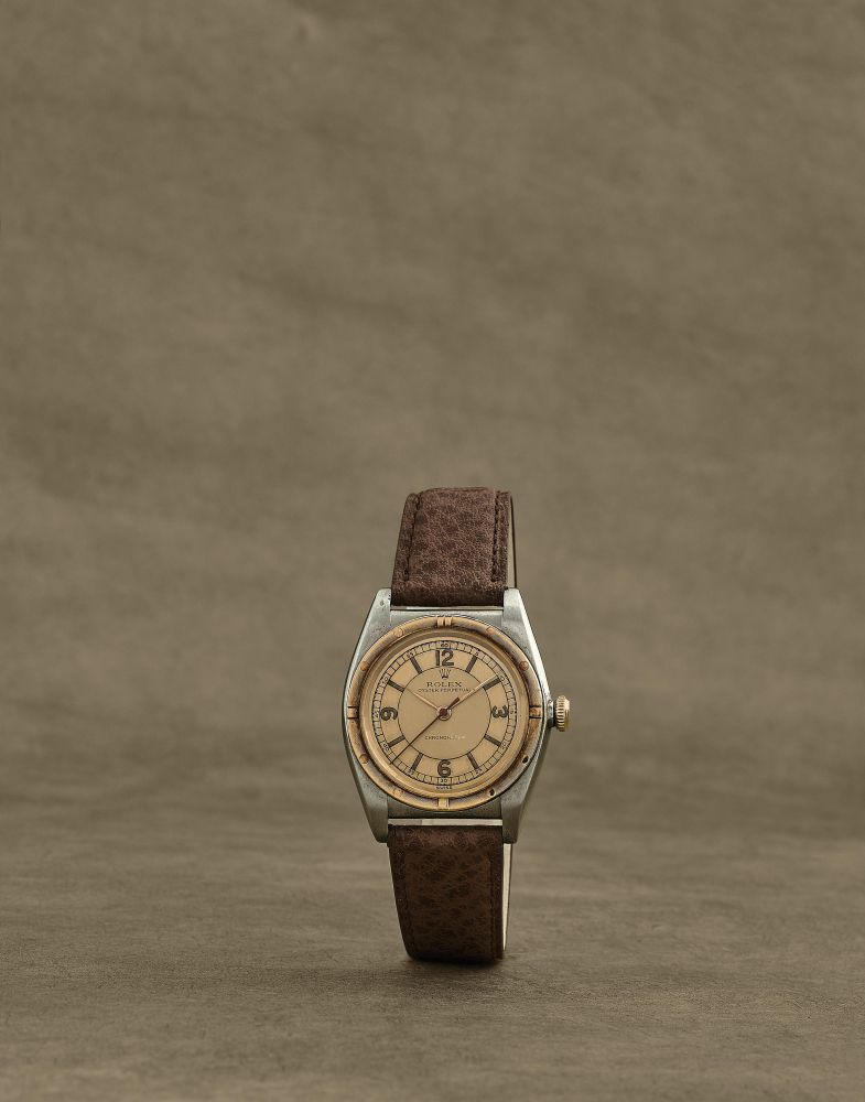 Rolex. Montre bracelet en or jaune 18K (750) et acier bubble back mouvement automatique