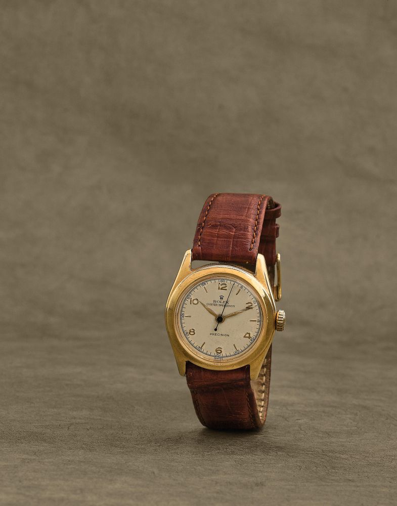 Rolex. Montre bracelet en plaque or mouvement mecanique