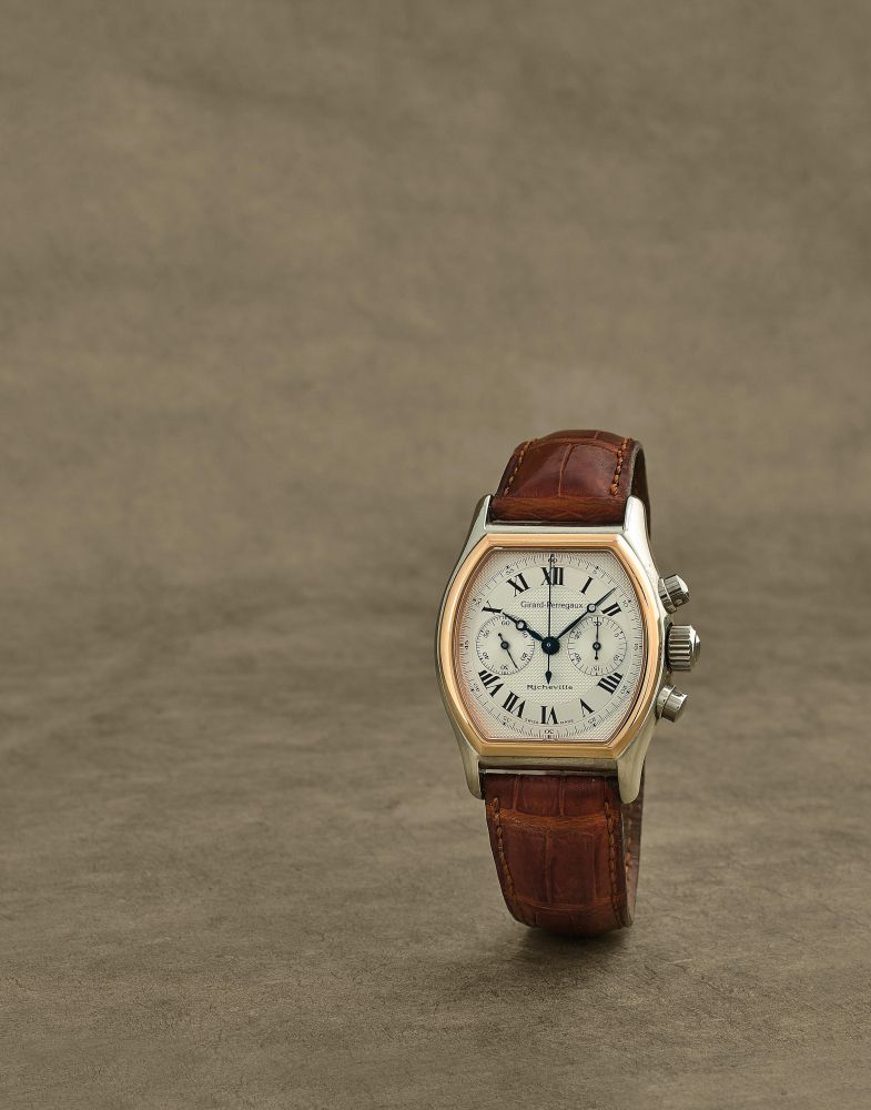 Girard-Perregaux. Chronographe bracelet en plaqué or et acier mouvement mécanique