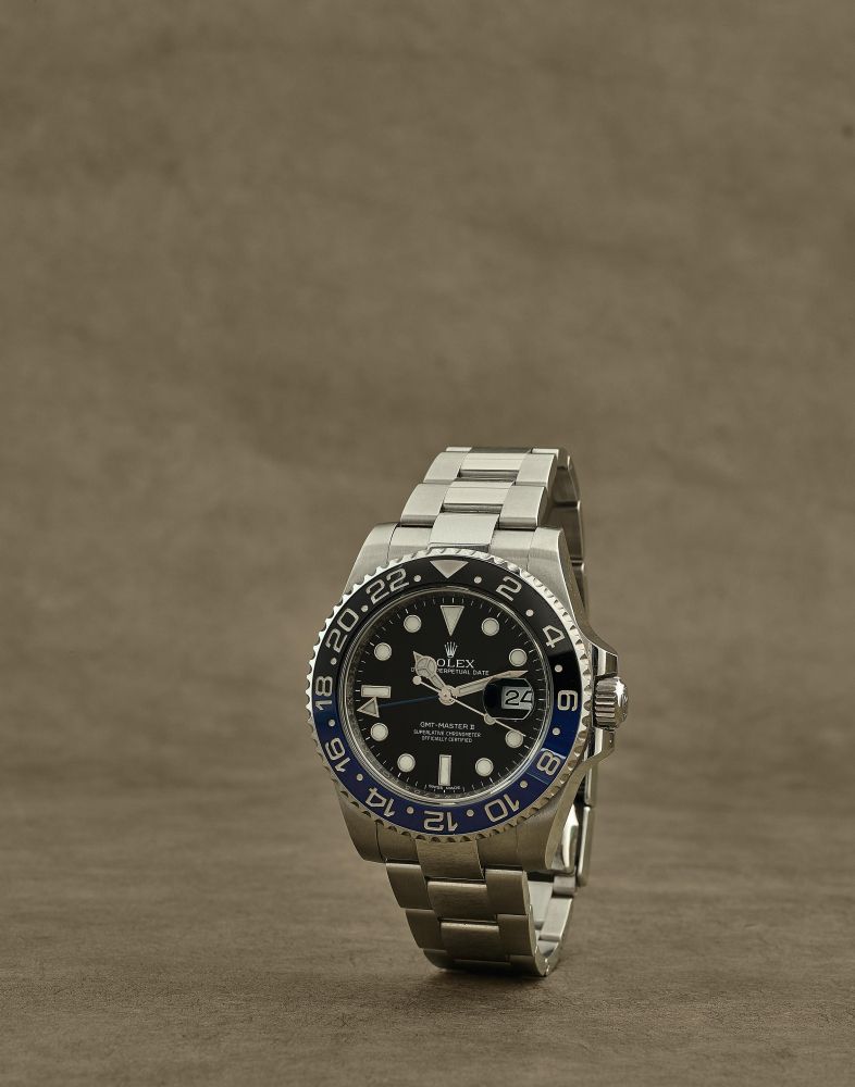 Rolex. Montre bracelet en acier avec date et 2nd fuseau horaire mouvement automatique