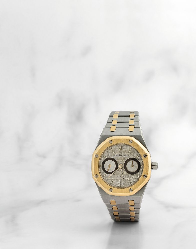 Audemars Piguet. Montre bracelet en or jaune 18K (750) et acier avec date mouvement automatique