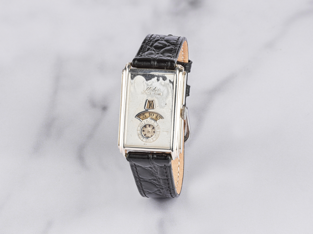 Mido. Rare montre bracelet en argent (800) à heure sautante mouvement mécanique