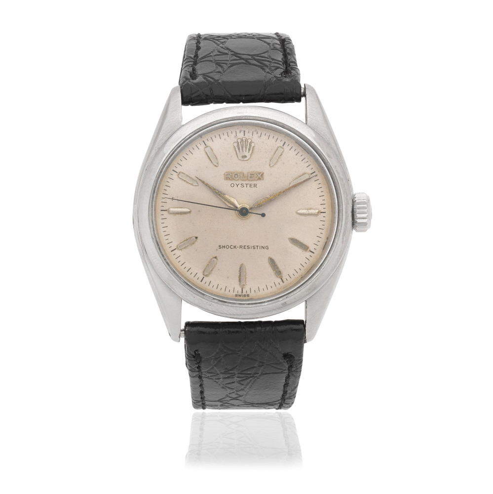 Rolex. A stainless steel manual wind wristwatch