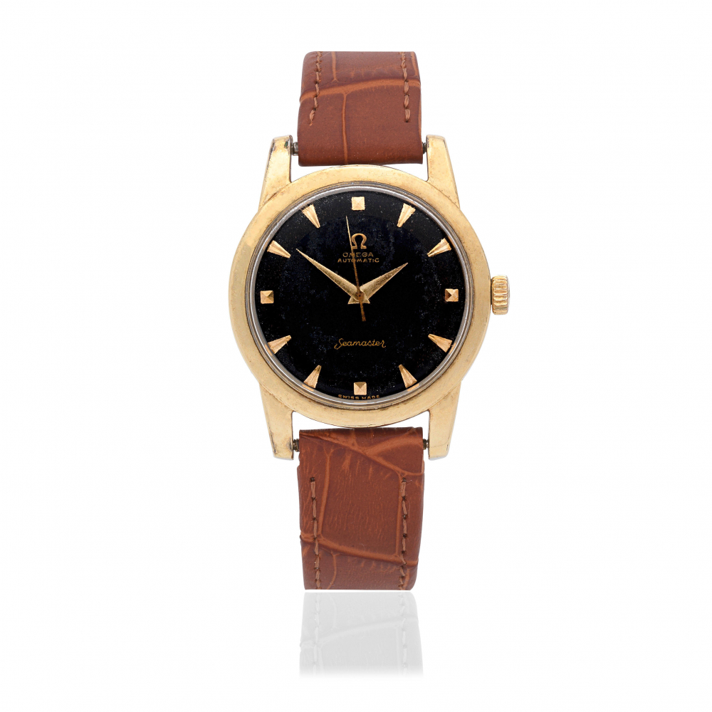 Omega. A gold plated stainless steel bumper automatic wristwatch
