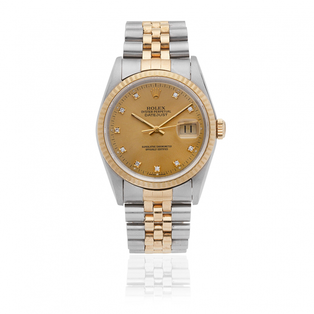 Rolex. A stainless steel and gold diamond set automatic calendar bracelet watch