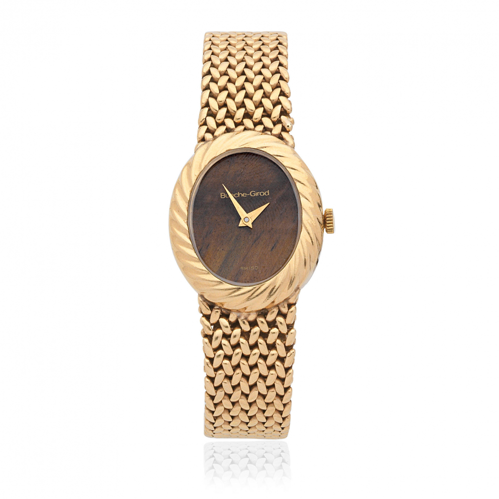 Bueche-Girod. A 9K gold quartz bracelet watch with tiger's eye dial